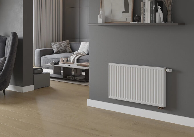 Radiateur à panneaux avec tête thermostatique