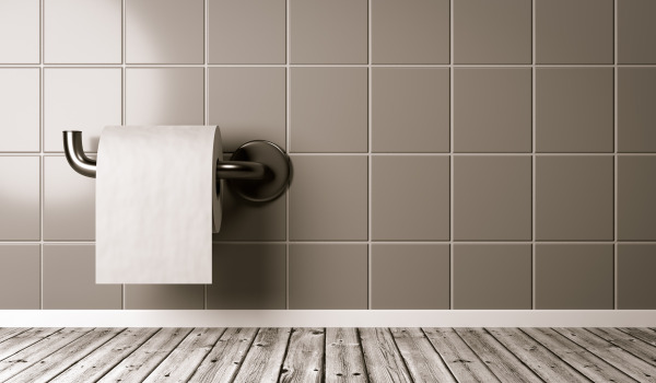 Comment coller un support de papier toilette ?