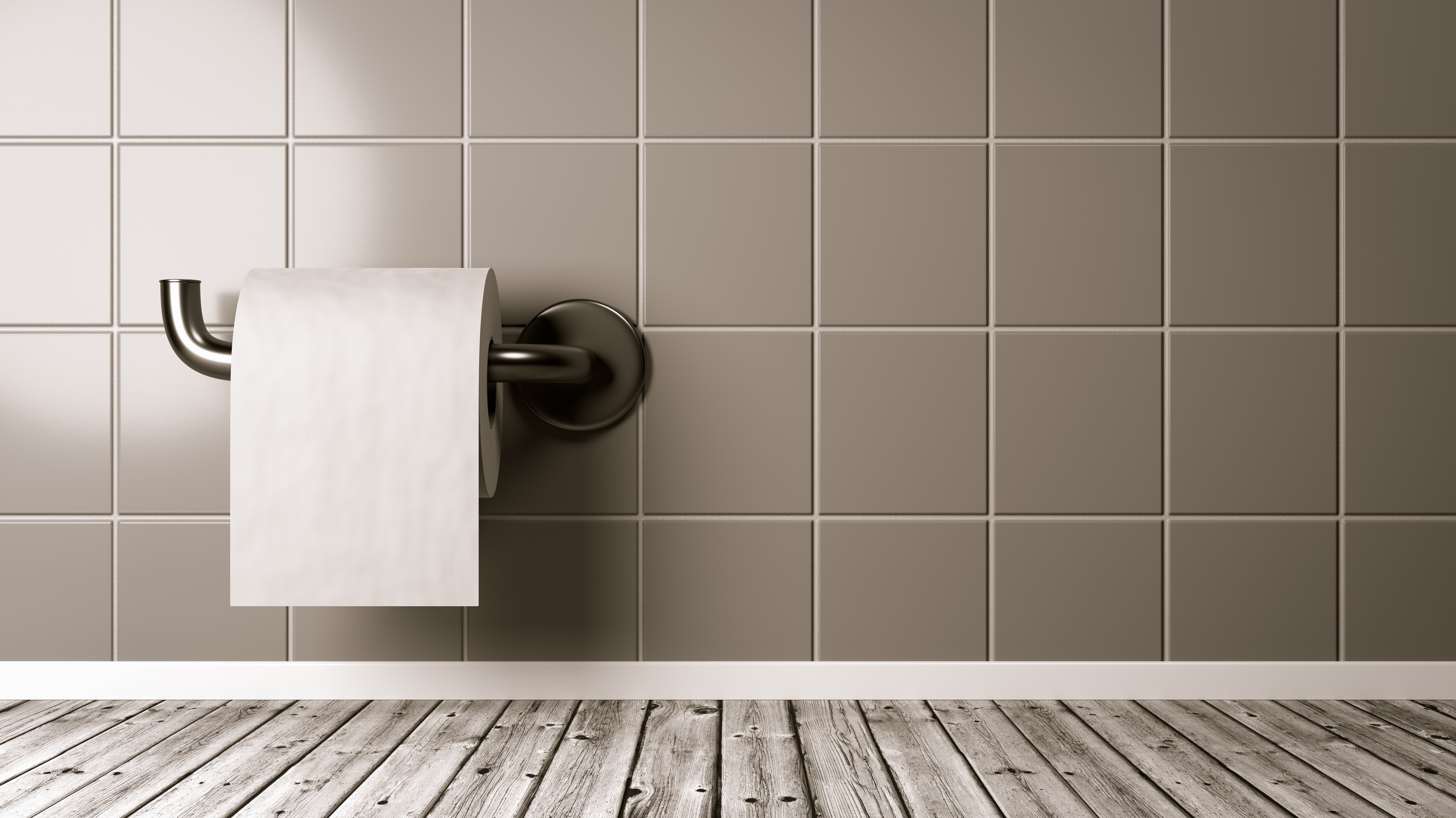 Comment coller un support de papier toilette ?